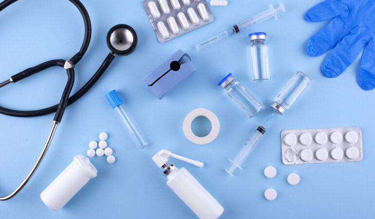 top-view-pills-stethoscope-arrangement