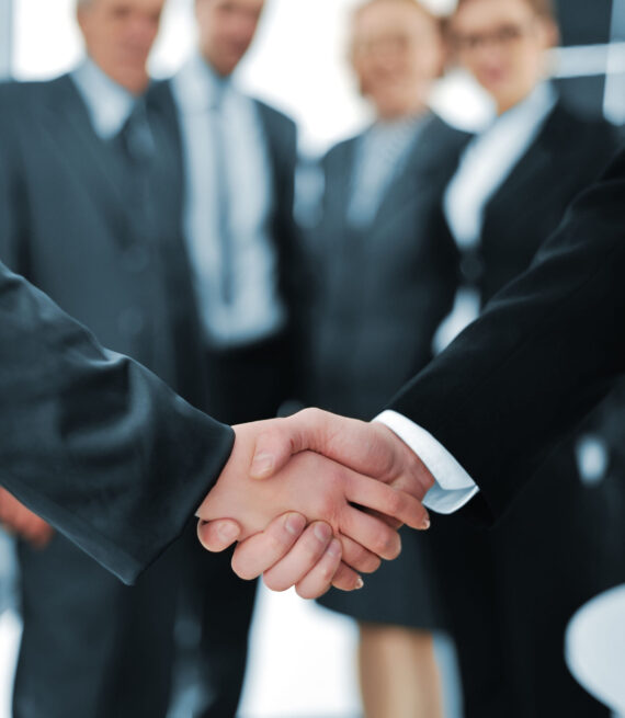 Handshake isolated on business background Handshake isolated on business background